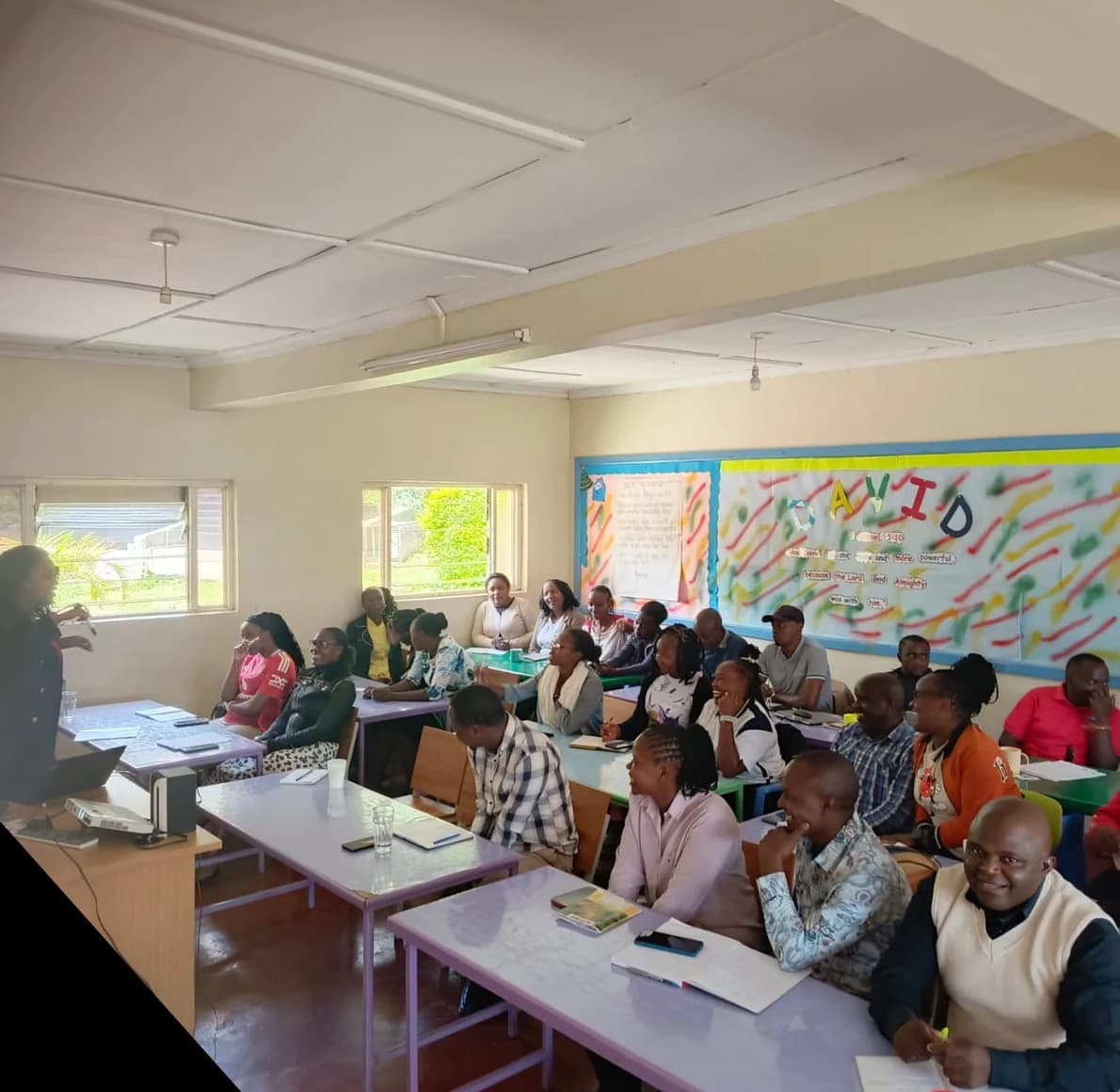 Teachers smiling during an EDSAFE safety training session